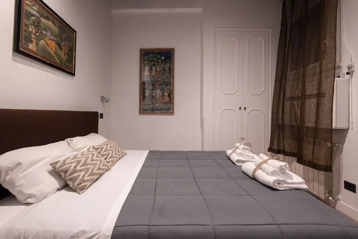 The double bed, made up.
